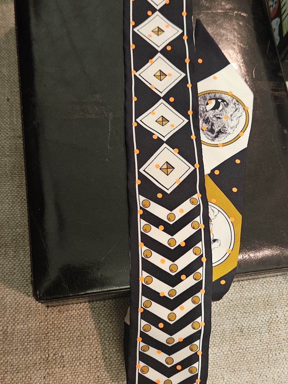Silk-style Black and White Geometric Men’s Scarf with Orange Accents